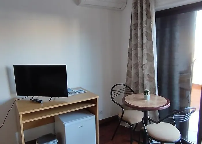 Проживание в семье Quarto Com Varanda No Centro Em