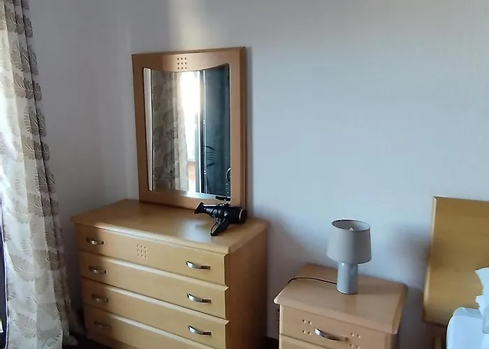 Проживание в семье Quarto Com Varanda No Centro Em *